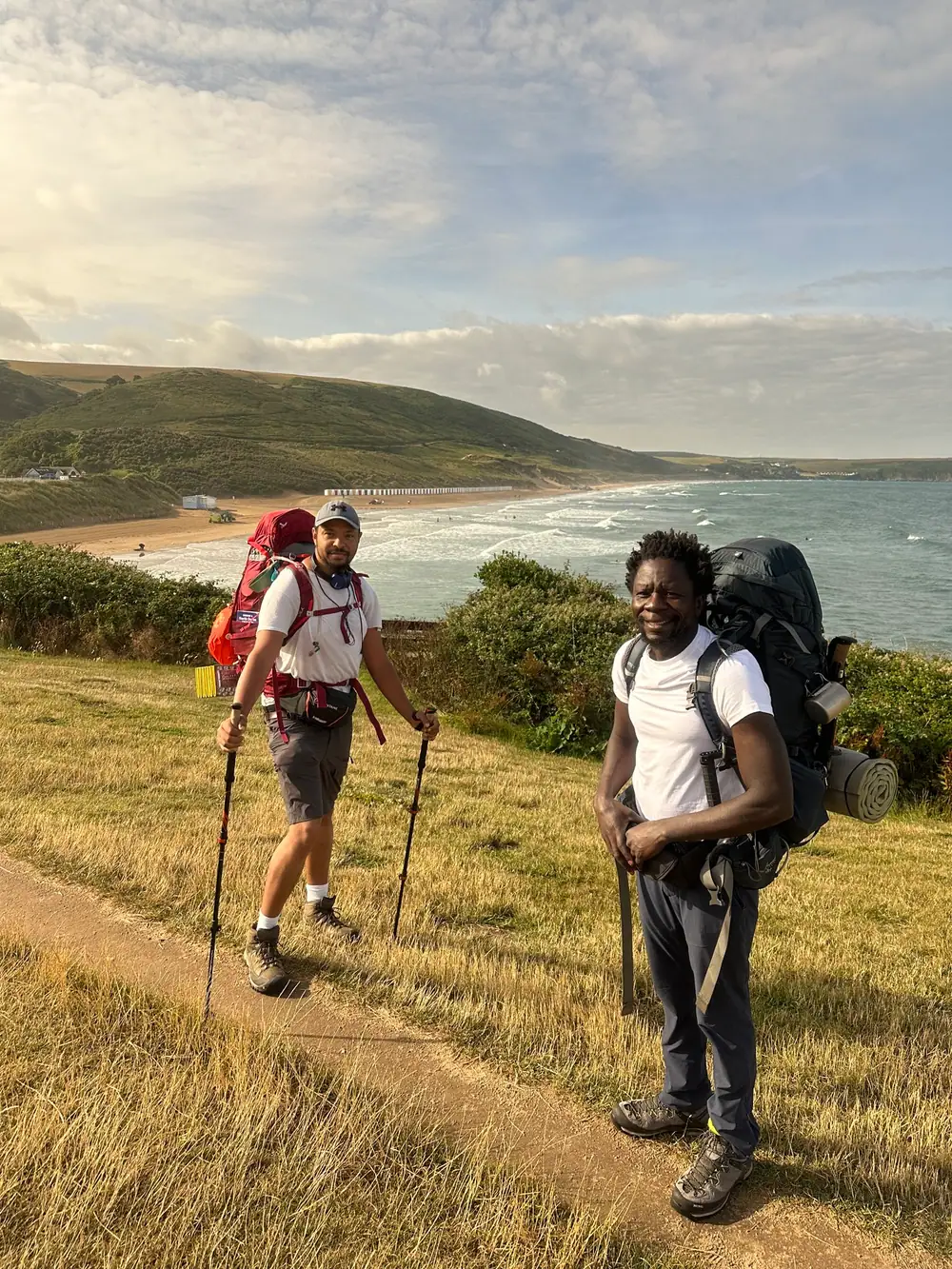Sean Lewis and Andrew Okello on the South West Coast Path